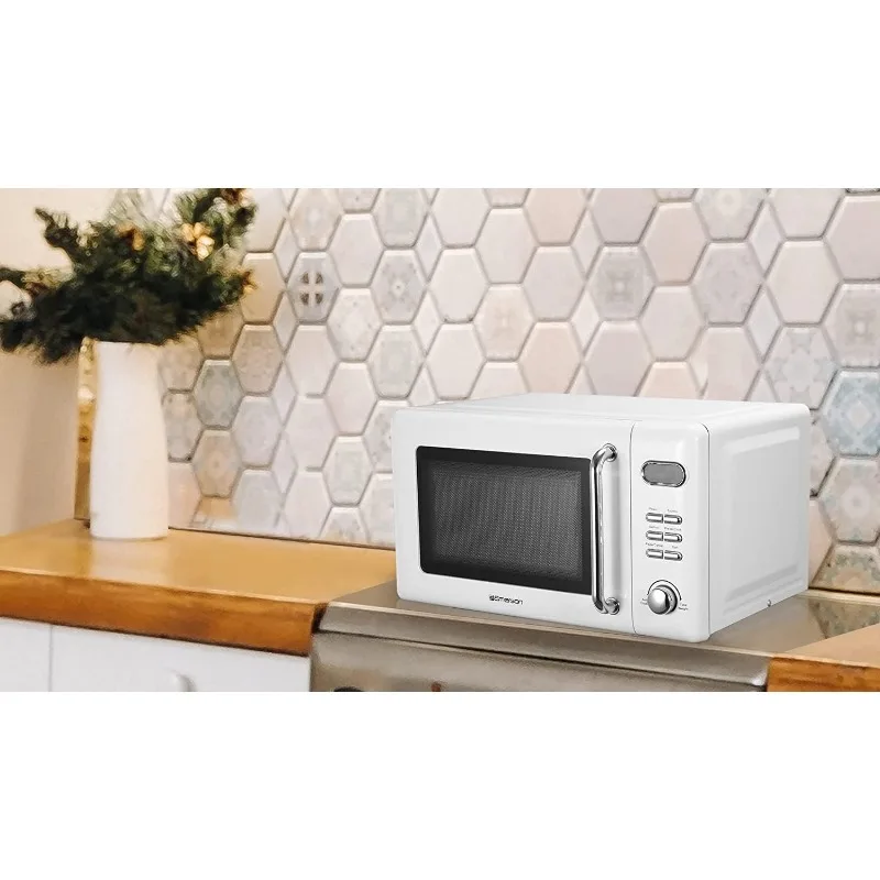 Compact countertop microwave with push button controls, LED display, 5 power levels, glass turntable and child safety lock