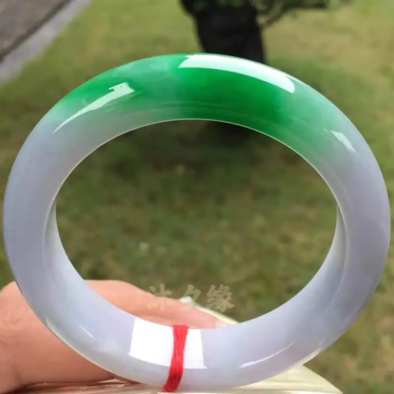Ice-, white base, green Yang jadeite bracelet, featuring delicate spring-like colors and a luxurious design