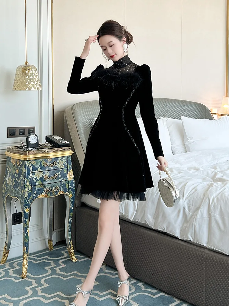 Lente nieuwe dames Franse opstaande kraag taille afslankende zwarte onregelmatige fluwelen jurk