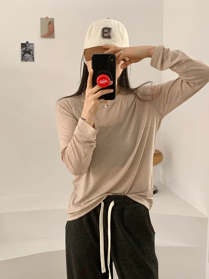 T-shirt ampia a maniche lunghe girocollo tinta unita casual da donna autunno e inverno