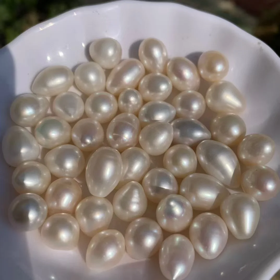 AA غرامة 100% الطبيعية البيضاوي لؤلؤ المياه العذبة فضفاض الأرز شكل خزر عازل لصنع المجوهرات سوار ذاتي الصنع أقراط اكسسوارات
