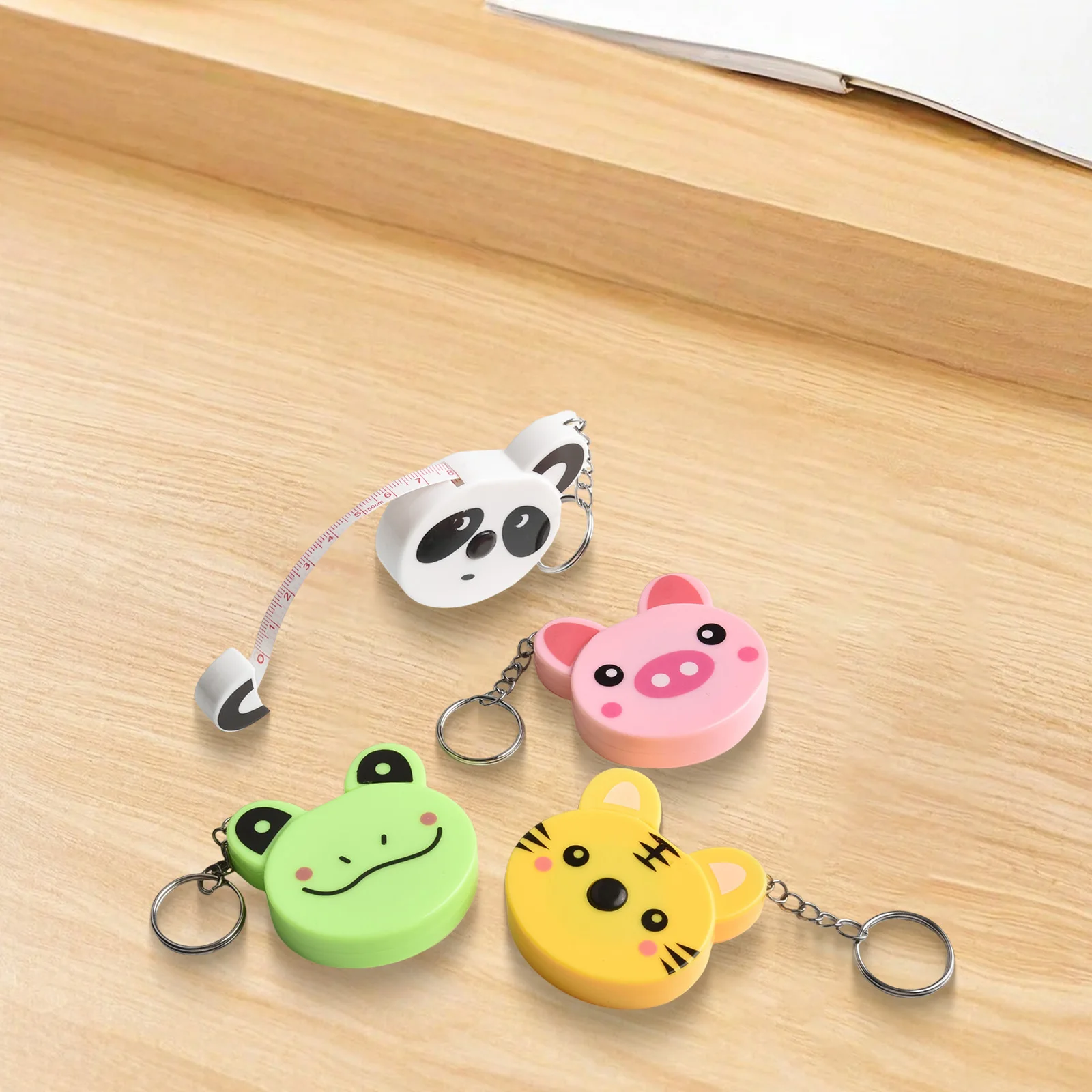 Cartoon Key Ring Tape Measure Set 4PCS Automatic Retractable Measuring Tools in Fun Animal Shapes Compact Size