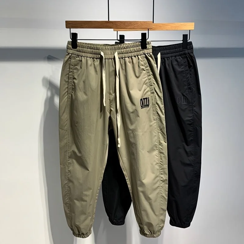 

Мужские летние повседневные брюки большого размера 300, свободного кроя, с вышивкой и нашивками, на шнурке, с манжетами, длинные