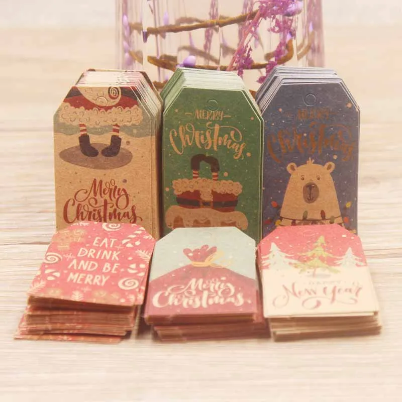 100pcs 4x2cm Merry Christmas Tags Kraft Paper Card Gift Label Tag DIY Hang Tags Gift Wrapping Decor Gift Card