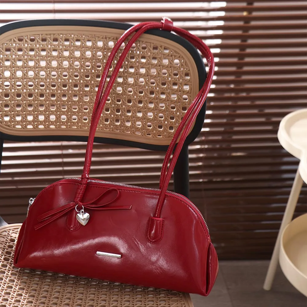 الموضة الكورية نمط منقوشة تحت الإبط حزمة بولي Leather الجلود عادية بوسطن حقيبة كتف بلون الحلو Bowknot المرأة حقيبة يد يؤرخ