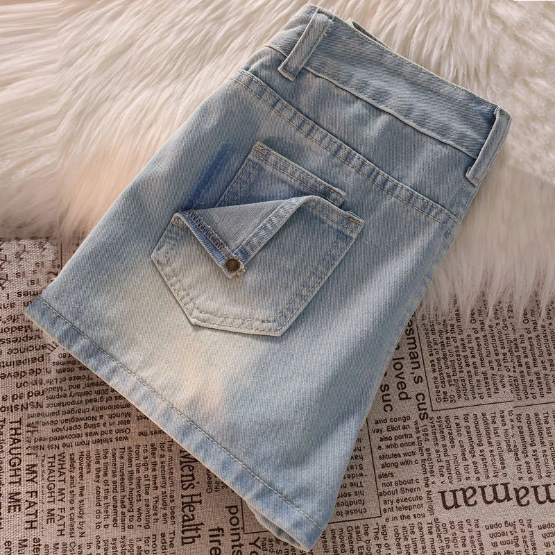 Half-body skirt pants female thin denim high-waisted design sense niche package hip a word hot girl anti-glare short skirt