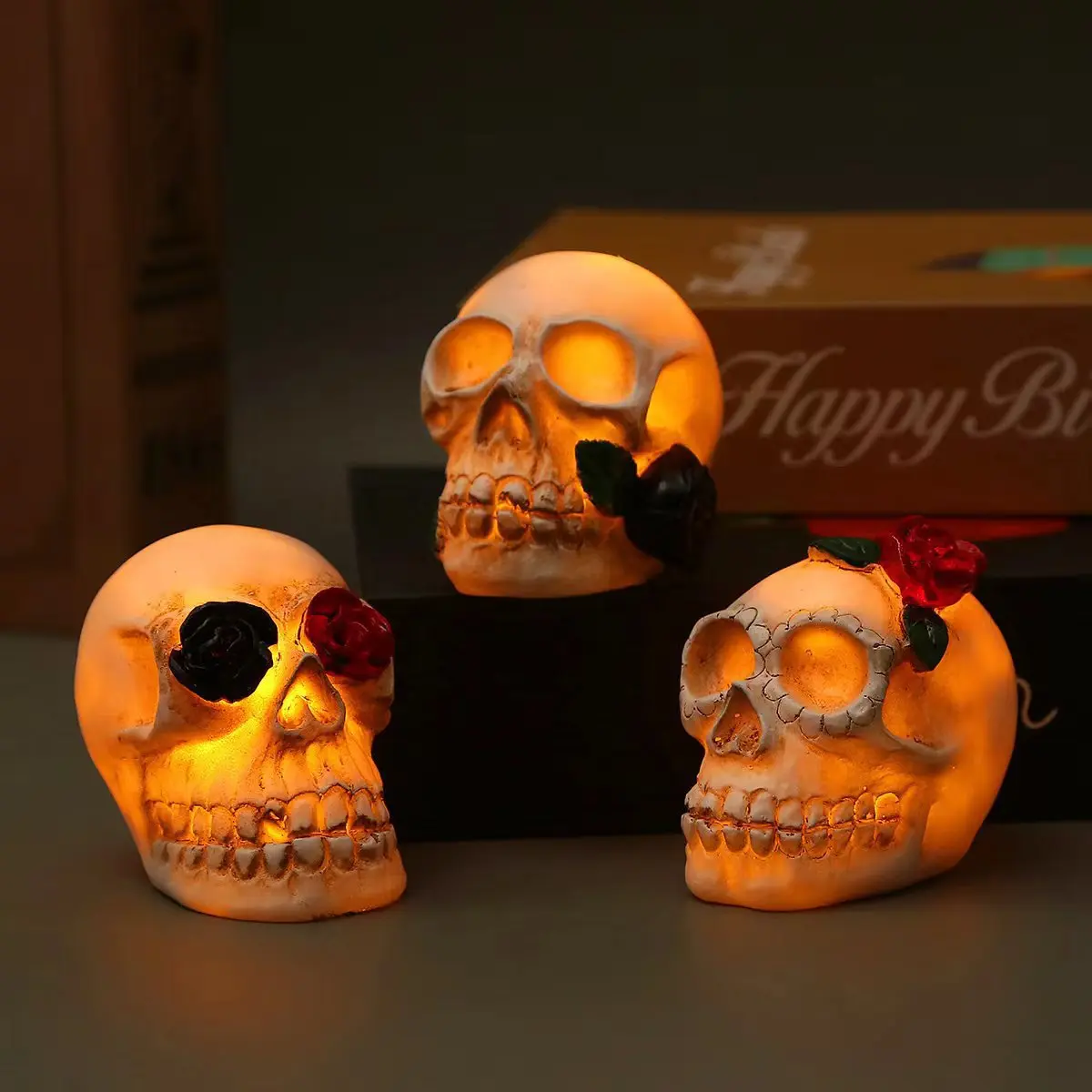 Halloween decoration, glowing skull, Halloween party atmosphere, desktop display, small ornaments, photography,props arrangement