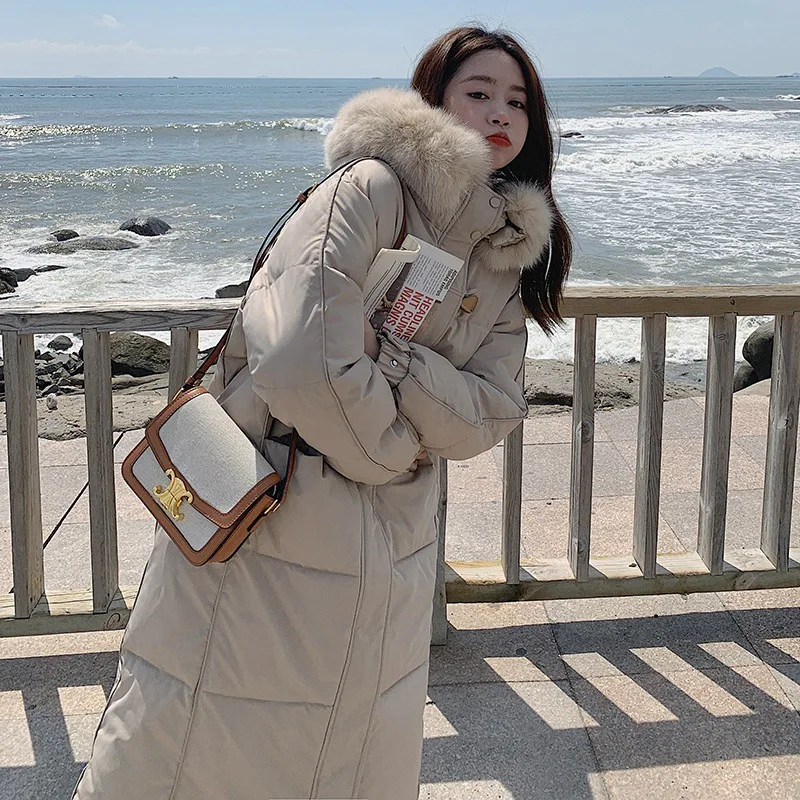 

Женские парки большого размера, однотонные куртки средней длины, карман на молнии с капюшоном и длинным рукавом, толстые свободные посадки, повседневные куртки 202, осень-зима