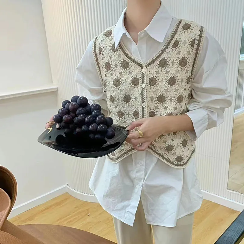 退屈なハニーレトロ中空アウトベストクロップトップ V ネックかぎ針編みノースリーブ女性の Tシャツシングルブレストファッション女性ブラウス