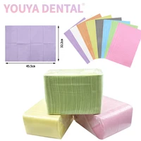 Babero desechable de Color Dental, almohadilla de limpieza para salón de belleza, delantal de papel para pacientes, herramienta de suministros dentales, 125 unidades por paquete
