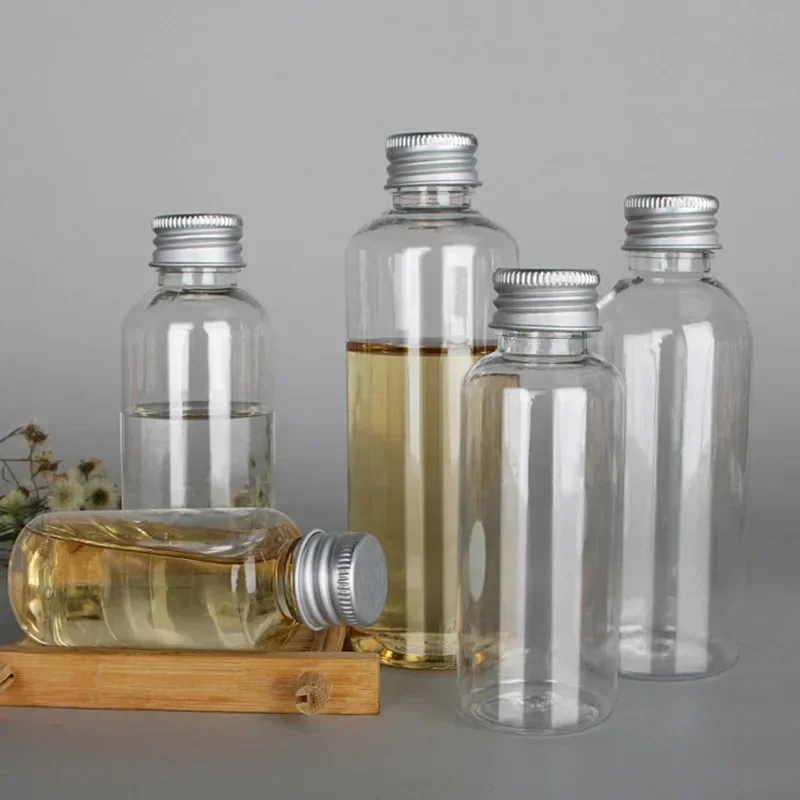 10 個 5 ミリリットル/8 ミリリットル/10 ミリリットル/15 ミリリットル/20 ミリリットル/30 ミリリットル卸売アルミキャッププラスチックボトルペット透明サンプルボトルエマルジョン化粧品ボトル