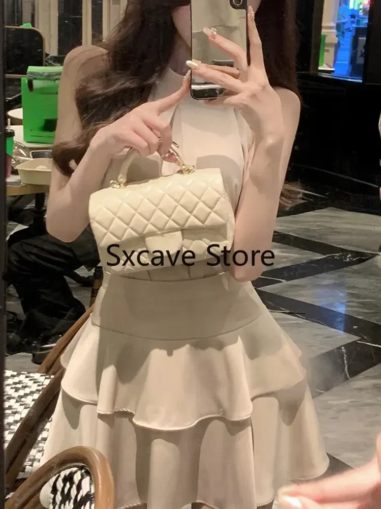 女性のためのエレガントなサテンのドレスセット,2ピース,ノースリーブ,ショートトップとミニスカート,パーティー,黒,韓国,夏,2023