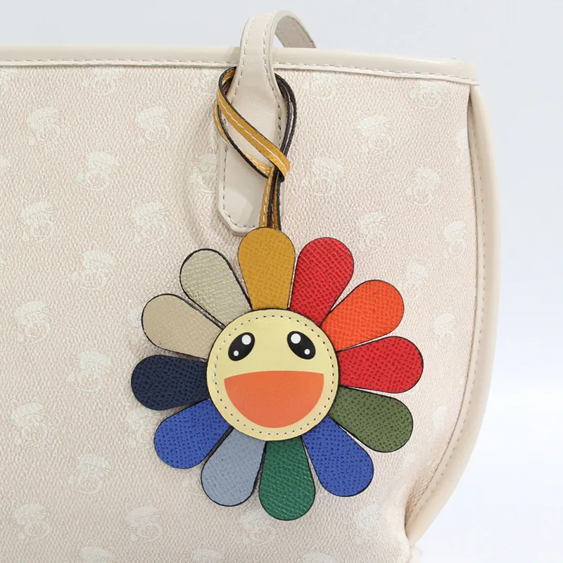 Colgante de girasol con cara sonriente de arcoíris de dibujos animados, llavero de cuero de pu con bonito flor colorida, colgante para bolso y coche
