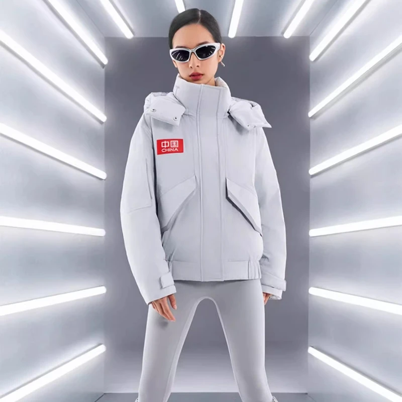 Kurtka puchowa Chericom Rocket Co-Branded z odpinanym kapturem, zapinana na zamek, wiatroodporne mankiety, elastyczny dół, kieszenie z klapką Y299077Y