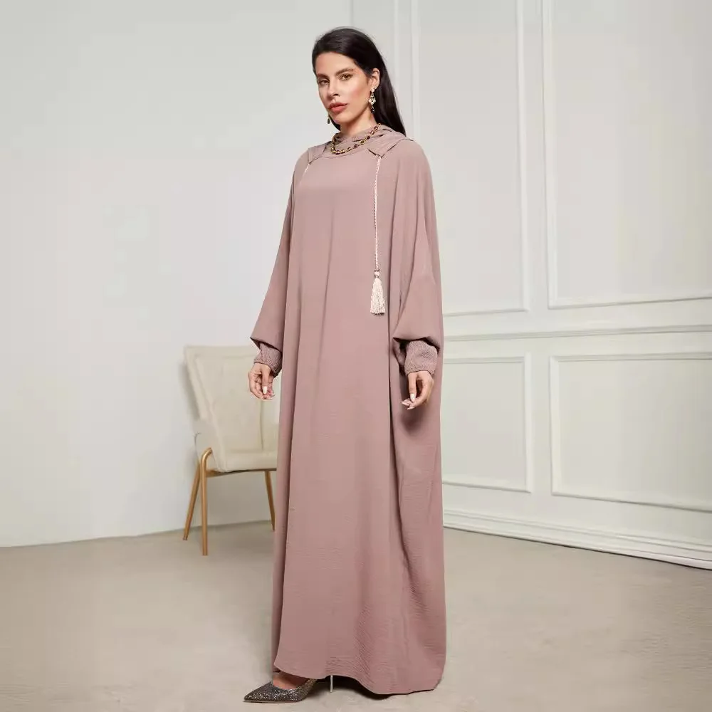 Nouvelle mode musulmane 2025 femmes couleur unie décontracté à la mode élégant à manches longues à capuche Abaya femme Jalabiya vêtements manteau robes