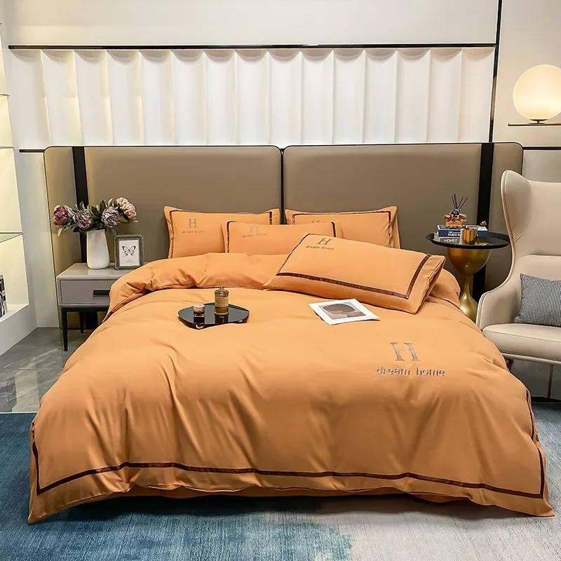 Light luxury simple washed cotton abrasive embroidery solid color four-piece set, home bed and breakfast hotel bedding linen set