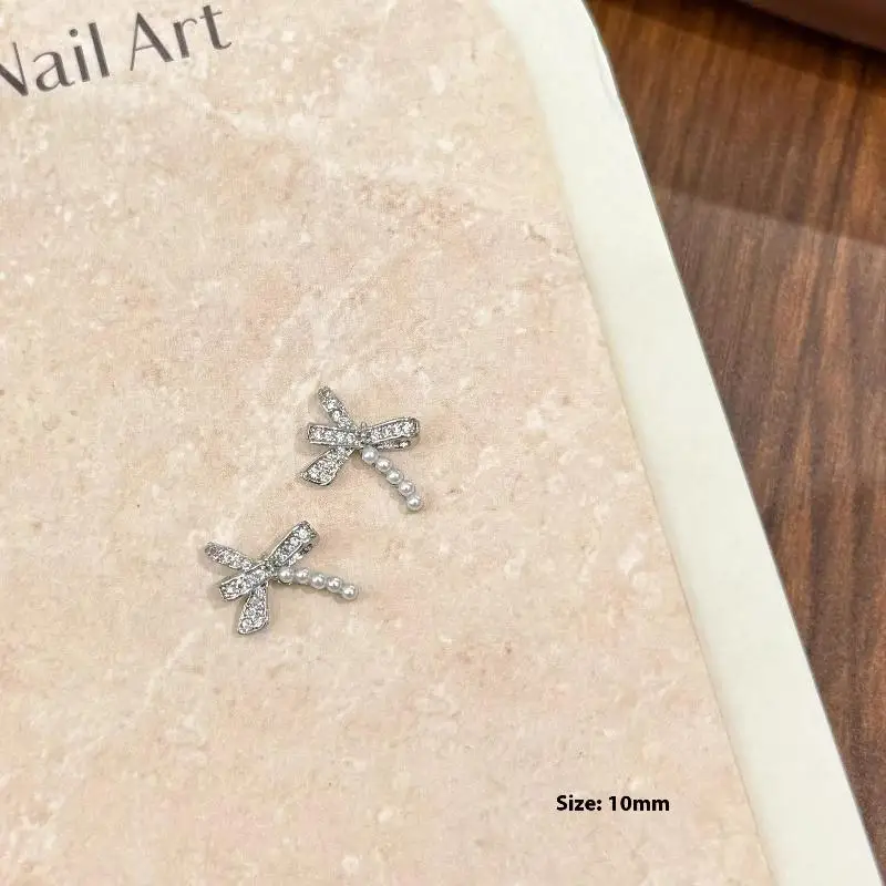 Lujosa decoración de uñas de circón, lazo de perlas de plata 3d, joyería en forma de mariposa, abalorio artístico para uñas, suministros de diseños de manicura Diy