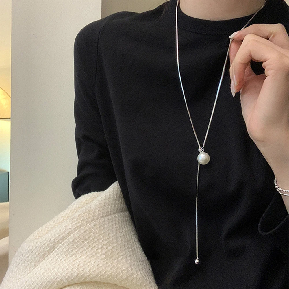 Pullable adjustable pearl long sweater chain, light luxury and high-end round ball tassel necklace for women