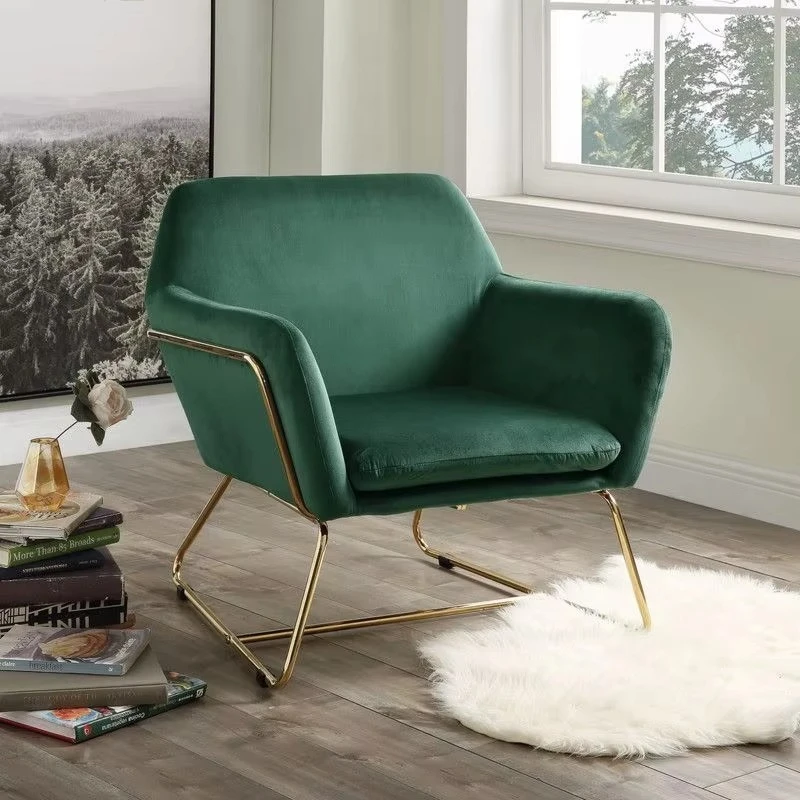 Velvet upholstered chair with stylish metal base for living room decoration