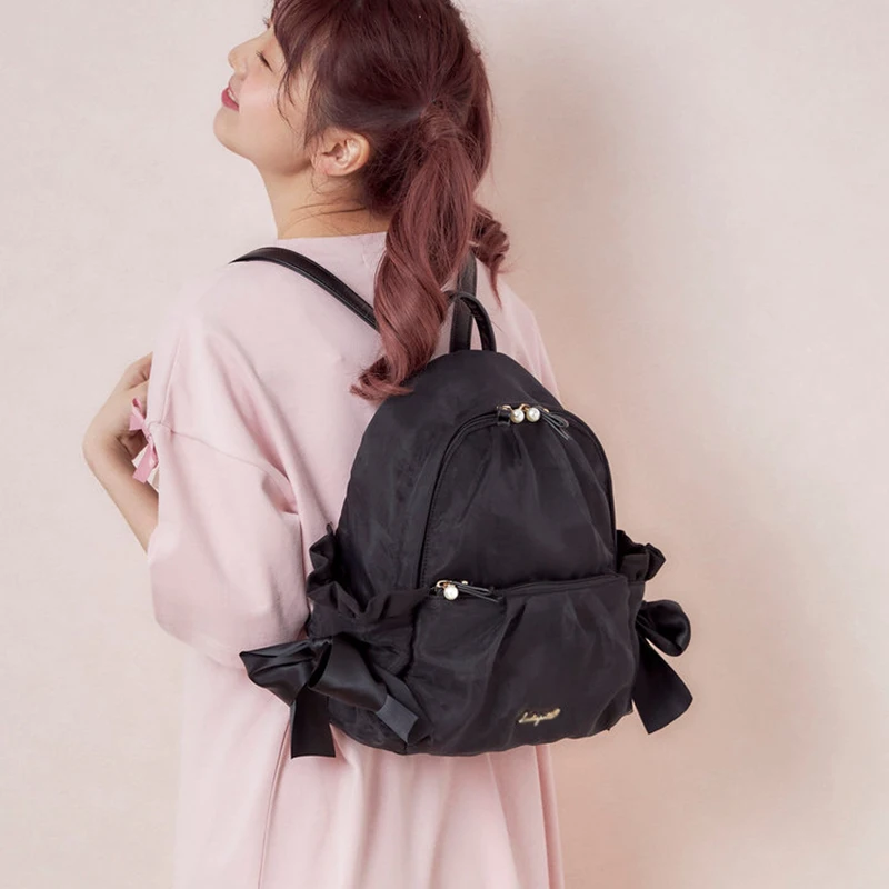 Mochila de malla con lazo para mujer, bolso escolar de estilo japonés, informal, bonito, con corazón, para viaje