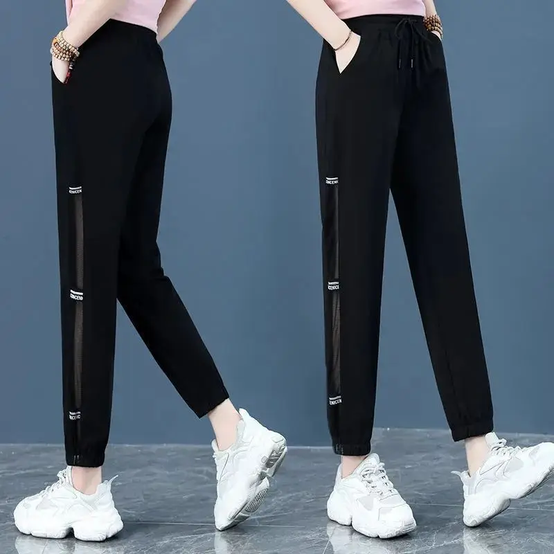 

Women's Summer Commuter Large Solid Elastic High Waist Loose Gauze Hollow Out Pockets Casual Harlan Ice Silk Belted Sports Pants