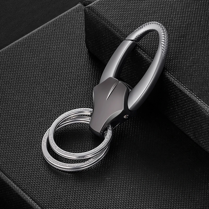 Llaveros de moda para hombre, colgante de coche, llavero de acero inoxidable, anillo, cadena de cabeza de toro, llaveros creativos, aleación de Zinc