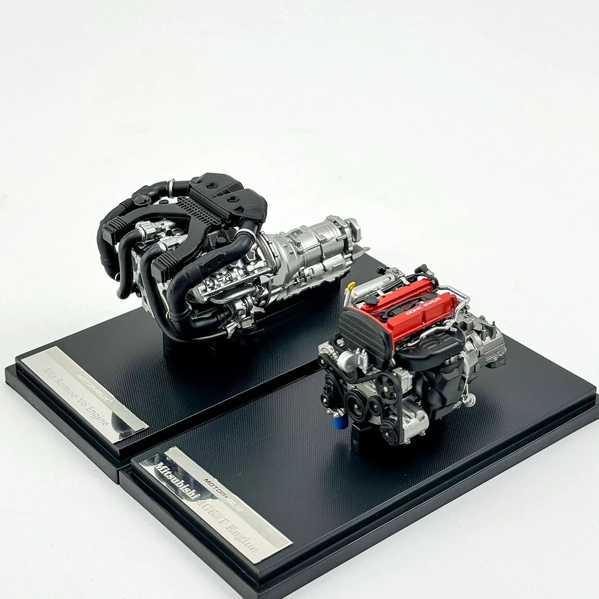 MH 1:18 Alfa Romeo en Mitsubishi EVO4 generatie statisch harsmotormodel