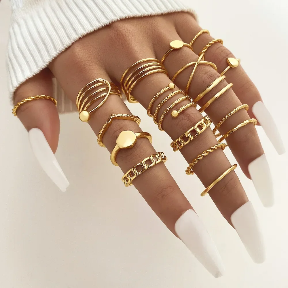 27 Uds. Conjunto de anillos chapados en oro con forma de corazón, serpiente y mariposa para mujer, anillo de dedo hueco geométrico de Metal, joyería, regalo de Navidad y Año Nuevo