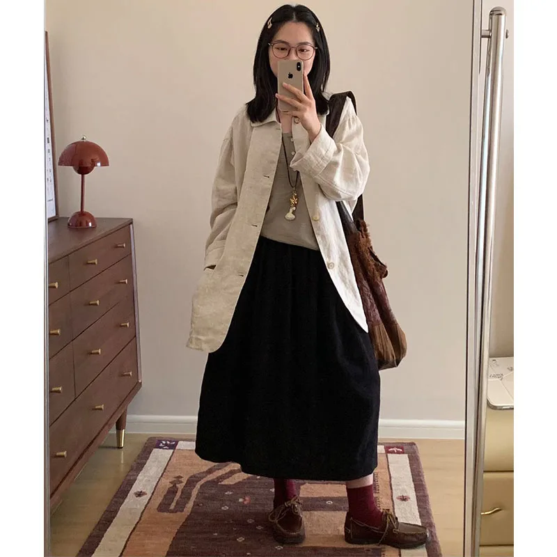 Falda de paraguas versátil ~ Tela Jacquard de lana 100% Otoño e Invierno Nuevo producto 2025 Media falda Falda negra Falda de capullo de flor alargadora de piernas para mujer