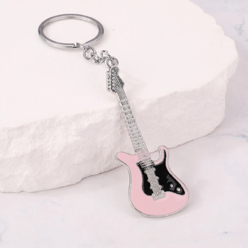 1pcs musical instrument pendant movable gift bag adorns guitar key ring