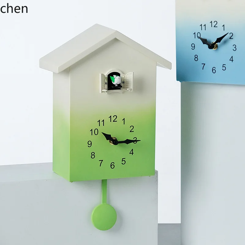 ZML wall clock with cuckoo that pops out of the window to announce the time, a little bird chimes the hour