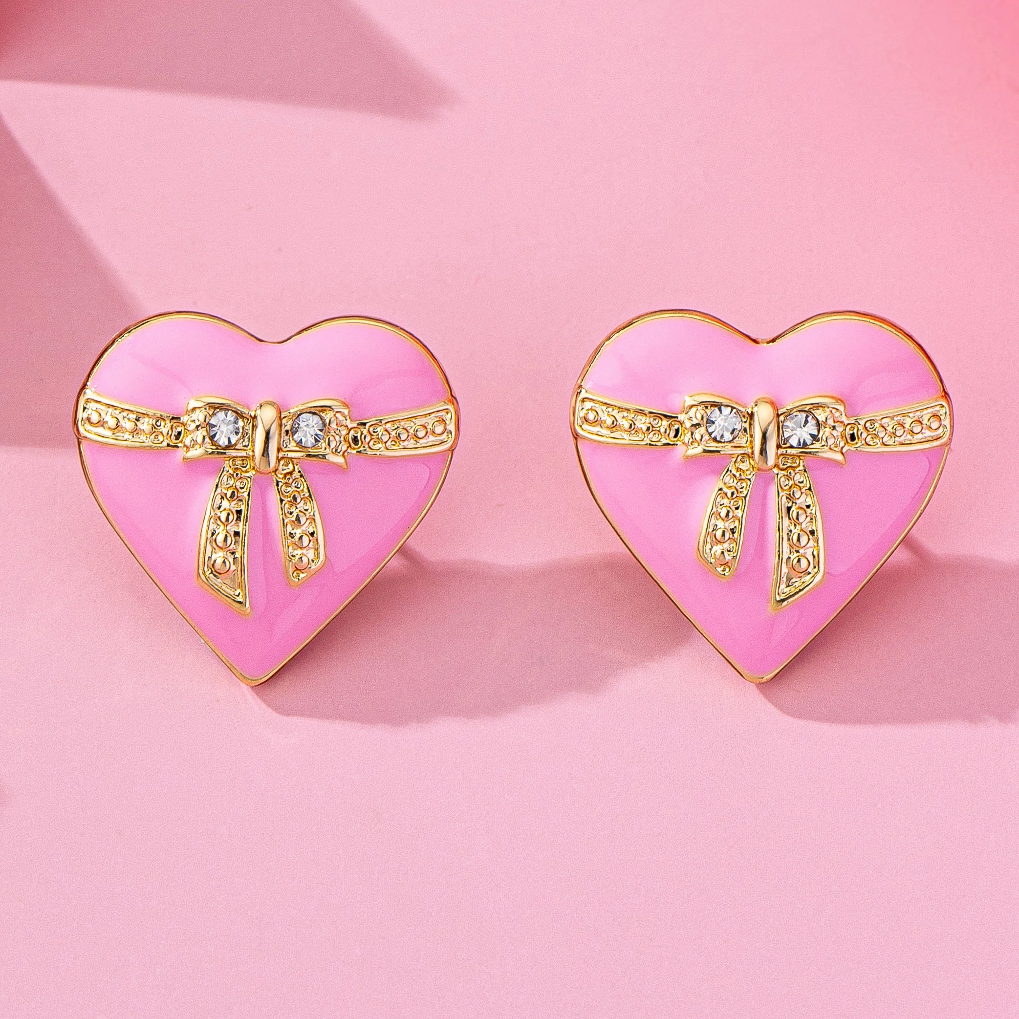 

Simple sweet and cute European and American style metal alloy enamel glaze peach heart bow love earrings, travel jewelry