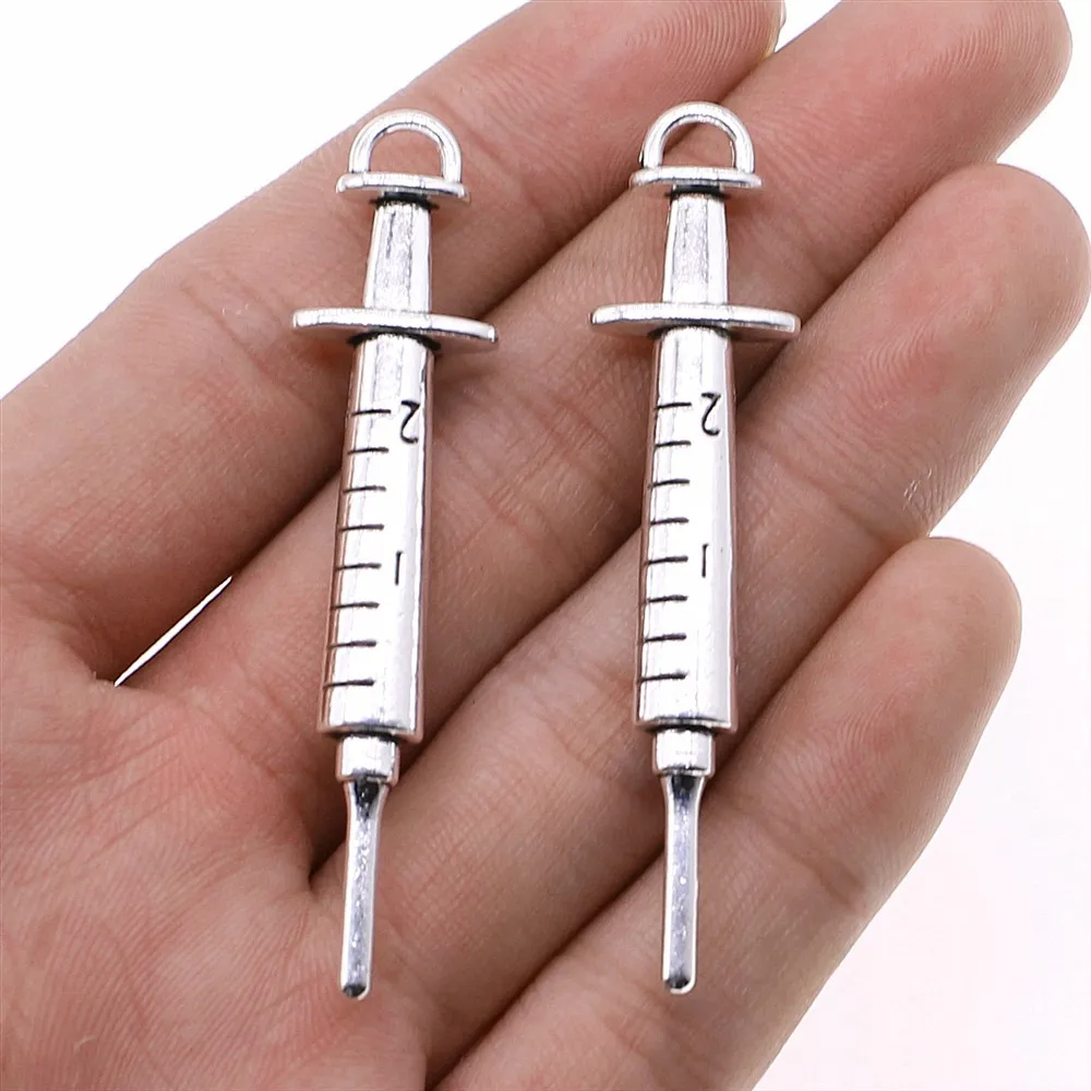 10 sztuk Charms lekarz pielęgniarka strzykawka termometr stetoskop antyczne srebro kolor DIY rzemiosło dokonywanie ustaleń ręcznie robiona biżuteria