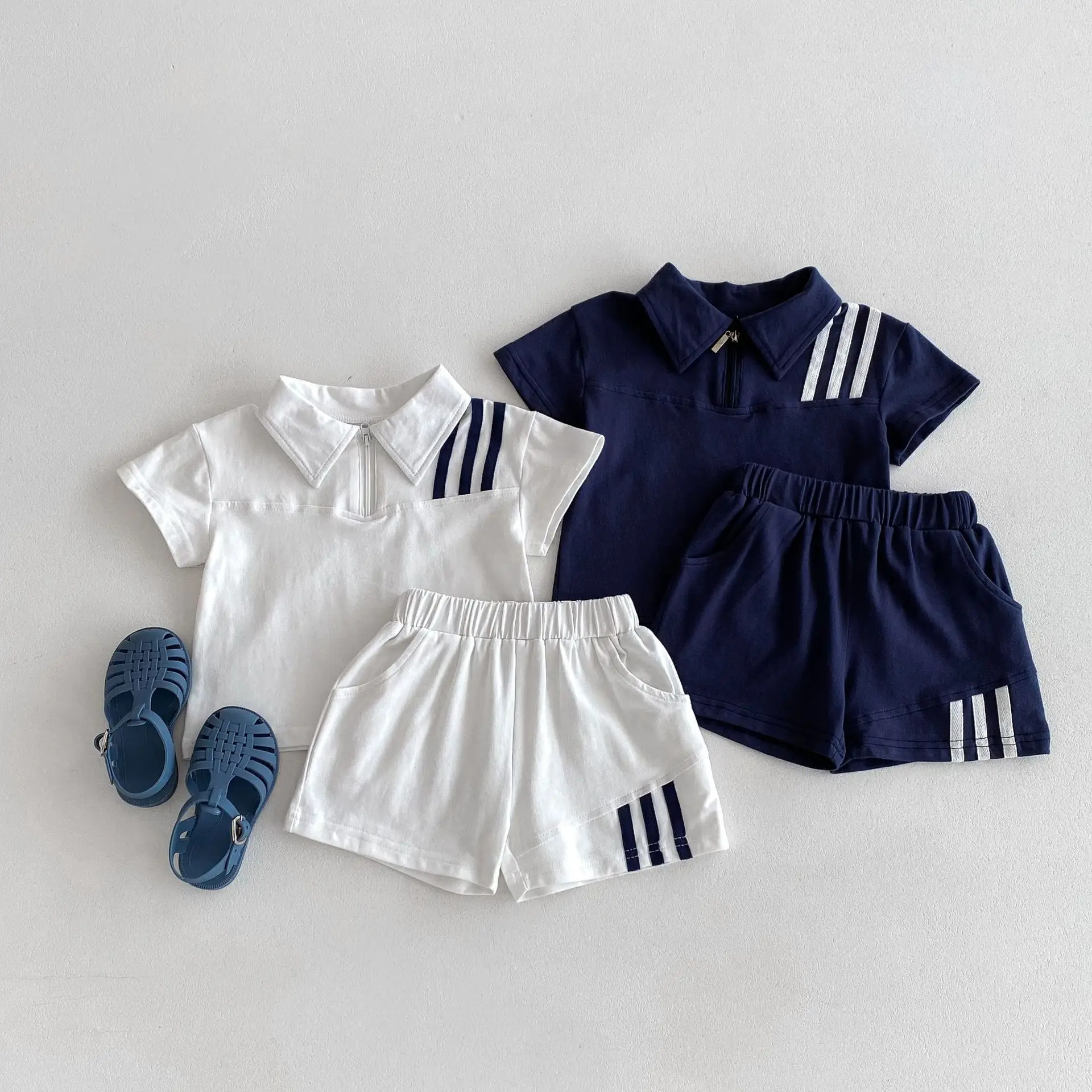 

2025 Summer New Children Short Sleeve Sports Set Baby Boy Girl Solid Polo Collar Tops + Shorts 2pcs Suit Kids Causal Outfits