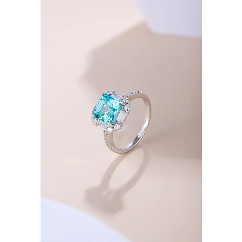 

Ruihe New Custom 925 Silver Ring 4.76ct Lab Grown Paraiba Sapphire Gems Simulated Diamond Zirconia Women Wedding Jewelry