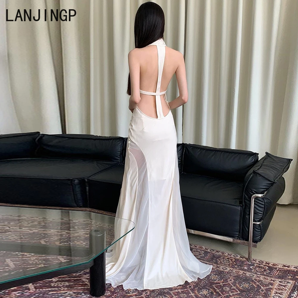 

Seaside design sense pure desire wind backless sexy sleeveless dress vacation thin temperament neck long skirt
