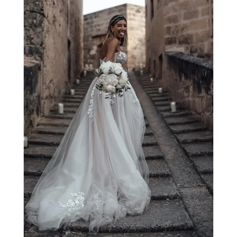 Customized Breathtaking Strapless Wedding Dress Featuring Stunning Crystals Lace Appliques and Flowy  Silhouette Bridal Dress