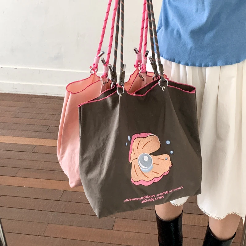 

Japanese-style cartoon embroidered canvas bag for women2026New Cute Tote Bag Shopping Bag Lightweight Simple Shoulder Bag