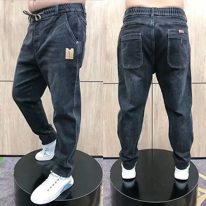 Autumn new men's daddy jeans fashion trend Joker straight elastic waist loose elastic casual pants.