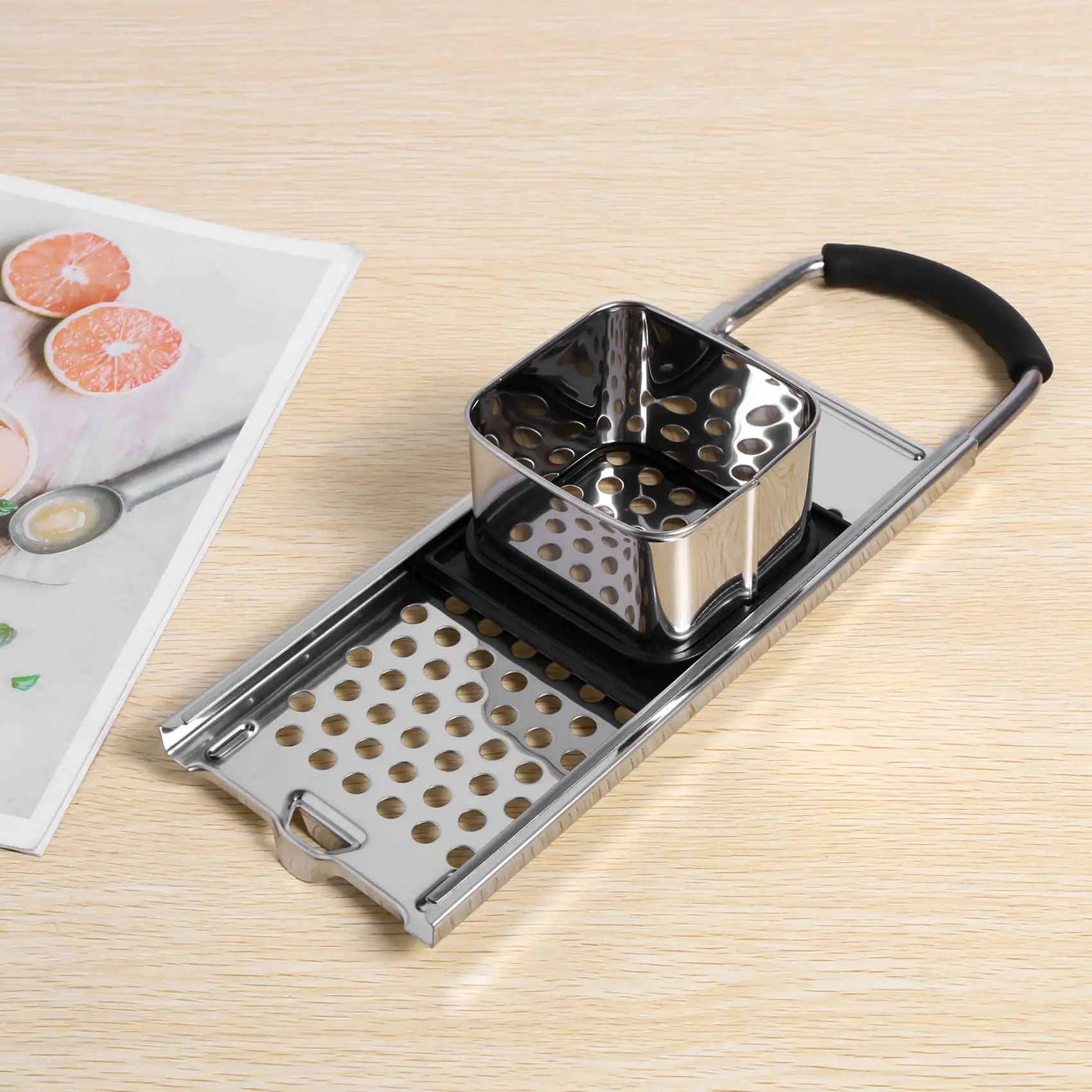 Fabricante de Spaetzle de acero inoxidable con mango de agarre de goma cómodo para Dumpling, fideos