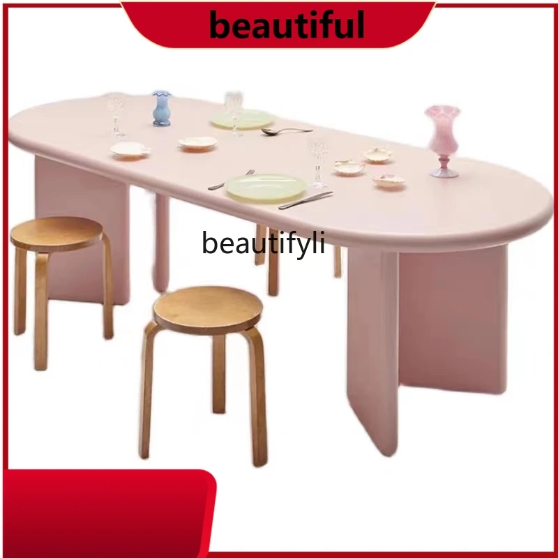 

Nordic solid wood cream style dining table modern simple oval household long table creative negotiation table workbench H