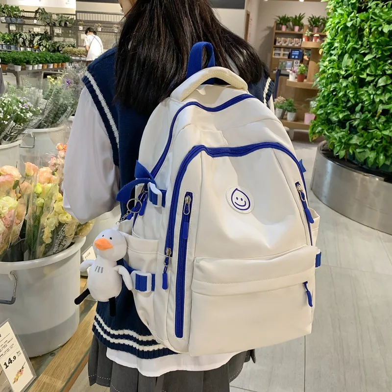 2025 new version of minority solid color backpack autumn new high school students large capacity multi-pocket schoolbag female