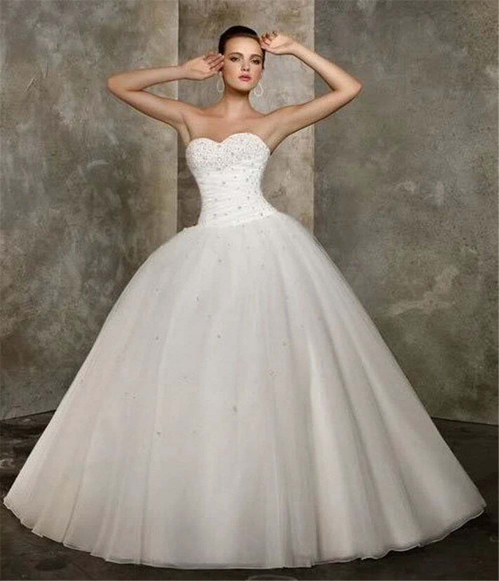 

ZJ9037 Romantic Strapless Zipper Ball Gown Wedding Dress 2025 Luxury Beading Appliques Princess Bridal Gown