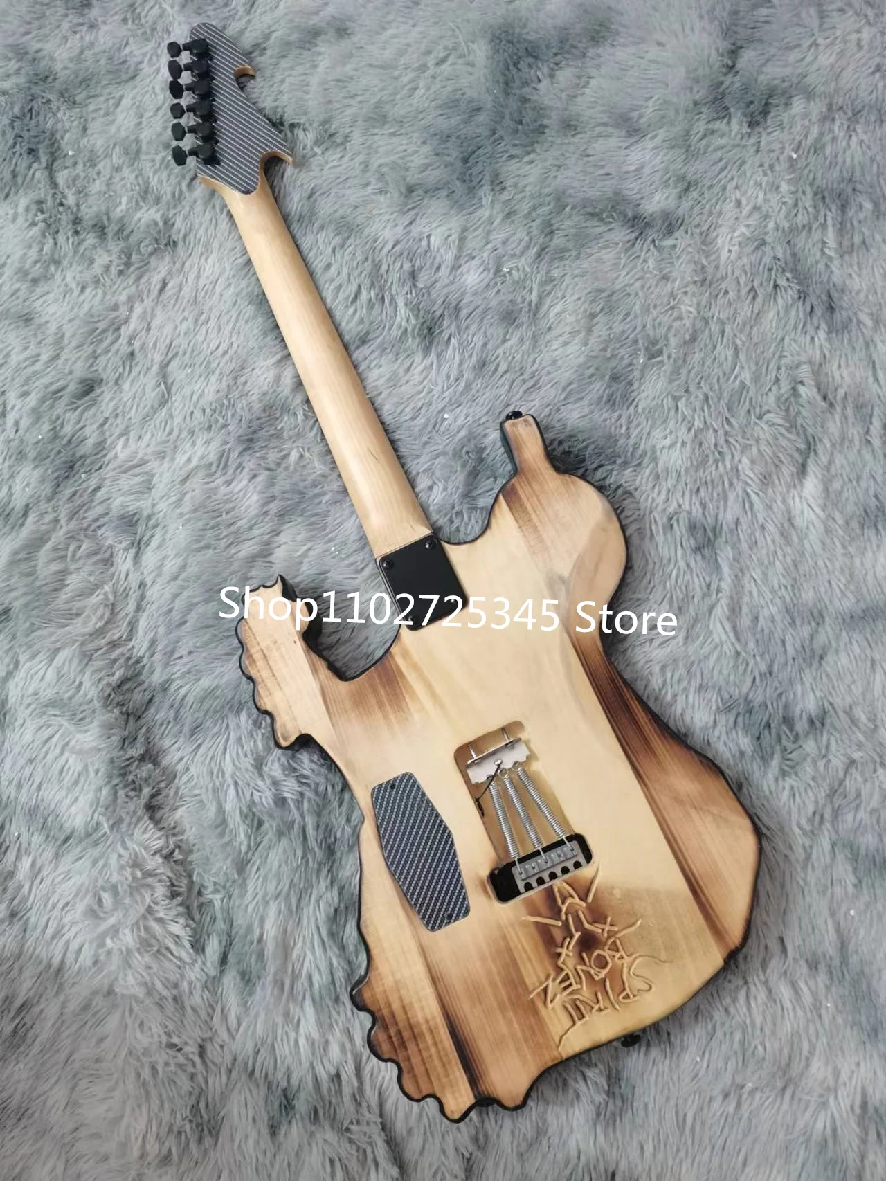 6-string skull electric guitar, maple fingerboard, silver accessories, tremolo system, free shipping