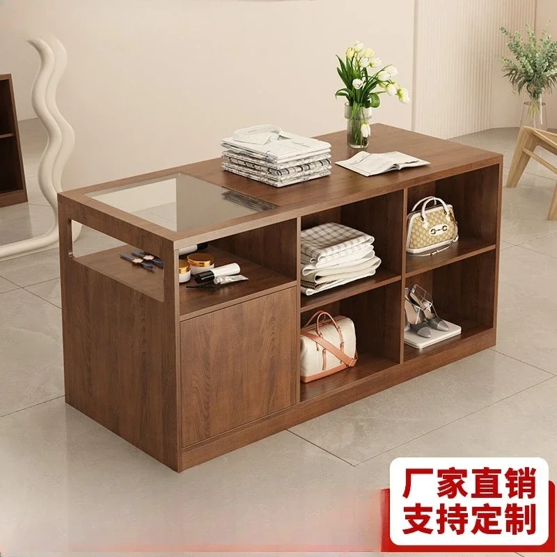 Clothing stores, women's clothing stores, island tables, flowing tables, store displays, tables, storage cabinets, simple cash r