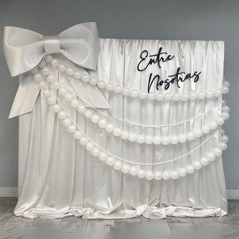Romantic wedding background decoration hanging white pearl wreath giant bow foam pearl string curtain