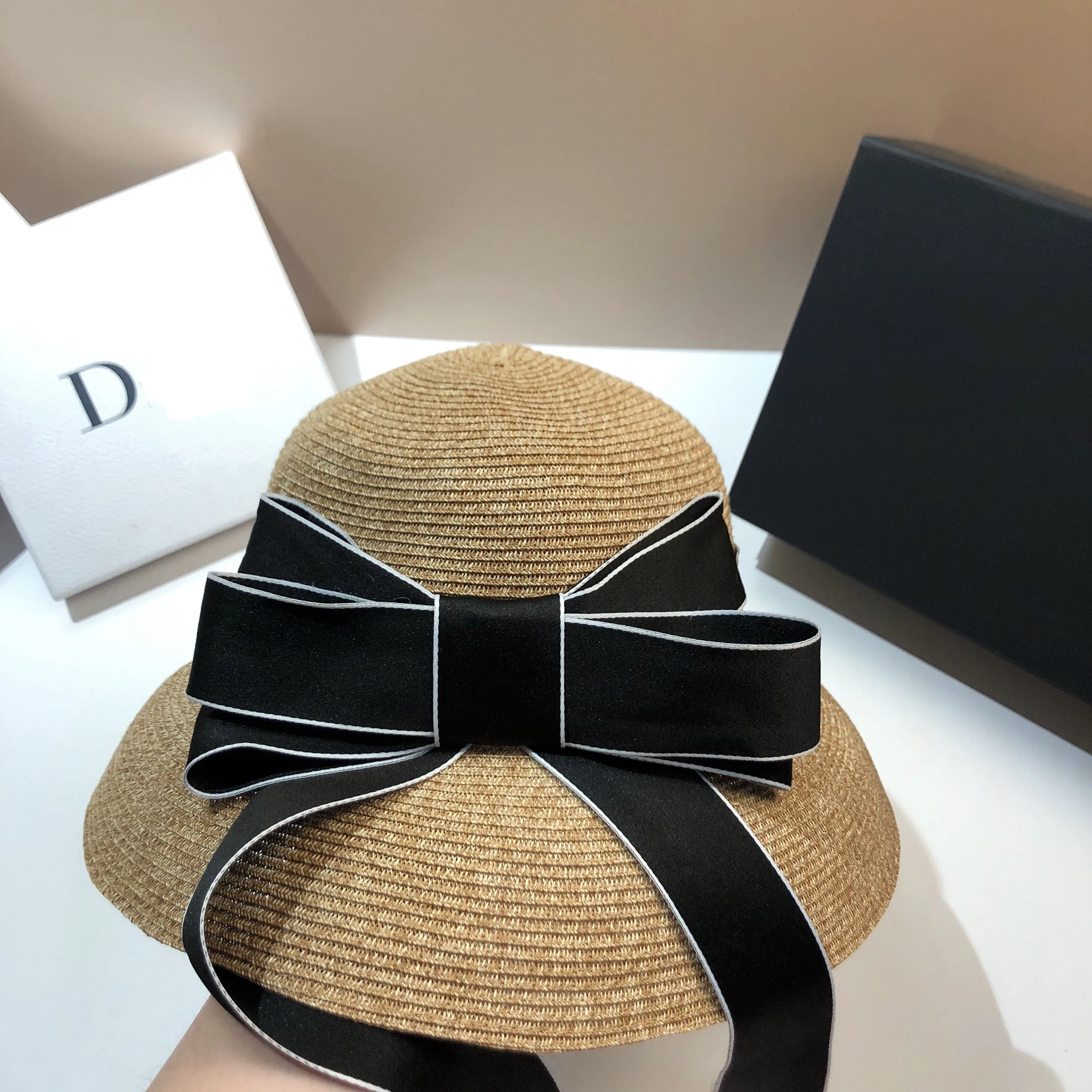 Summer high quality fine braid woven sun hat European and American French Hepburn style bow shade sun protection straw hat woman