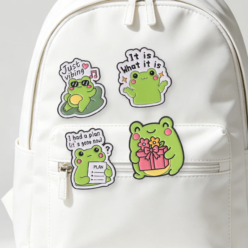 Flower Frog Pin - キュートな音楽を聴くカエルのエナメルピン、プランを立てていたカエルと花を持つカエルのギフトブローチ、バッグ、ラペルバッジ、ジュエリーギフト