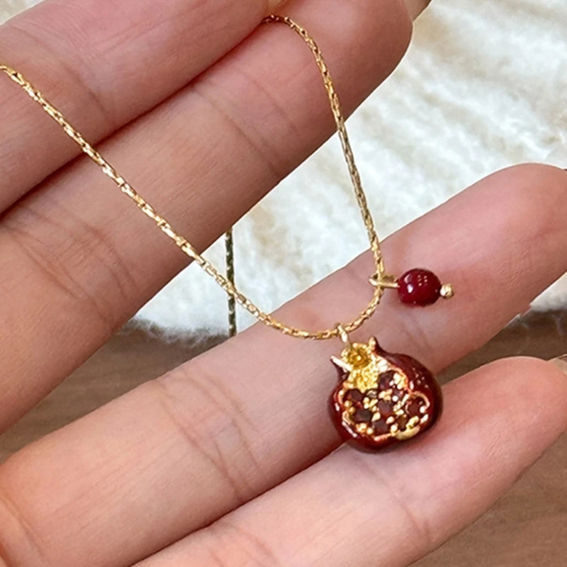 Elegant Pomegranate Necklace Symbolizing Abundance and Prosperity for Fashion Forward Women Seeking Unique Designs