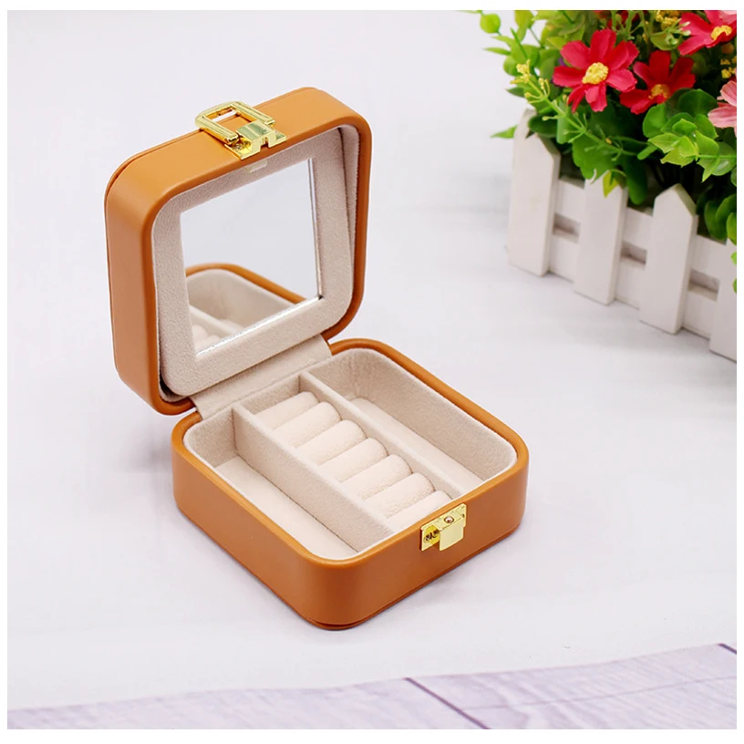 

Portable PU Leather Flip Jewelry Packaging White Orange Ring Earring Storage Boxes With Mirror For Travel